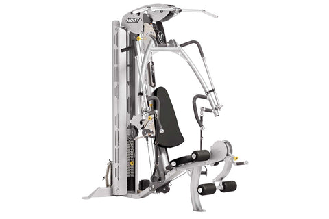 Hoist V4-Elite home gym with silver frame, black seat and handles, and integrated leg press station on white background