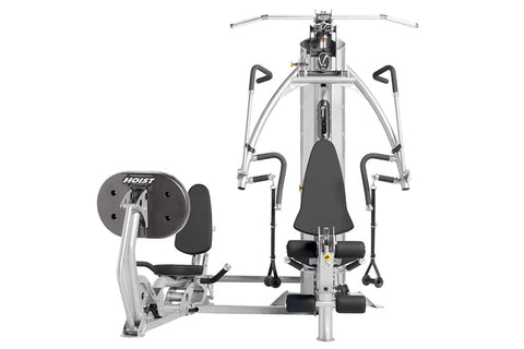 Hoist V4-Elite home gym with leg press attachment, silver frame with black seat and handles, front view on white background