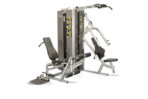 Inflight Vanguard 2-stack multi-gym with gray upholstered seats, silver aluminum frame, and dual weight stacks on white backg