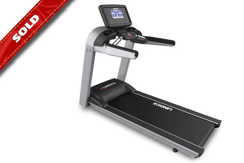 Landice L7 treadmill with silver frame, black running deck, black handlebar grips, and digital display console on white backg
