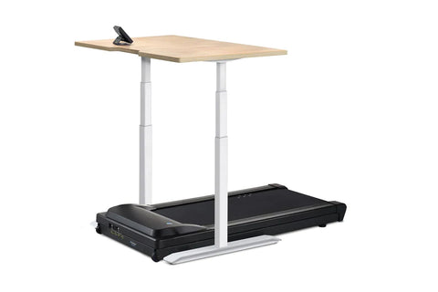 White desktop on black adjustable standing desk frame with integrated black treadmill base and digital display