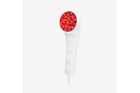 White handheld LED light therapy device with red light head on neutral background