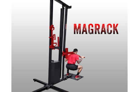 Black and red Marpo Magrack home gym functional training system with person in pink shirt demonstrating leg press exercise