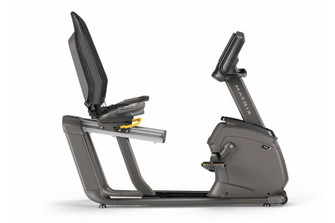 Matrix R50 recumbent exercise bike with black mesh backrest and gray frame, digital touchscreen console on adjustable arm, on