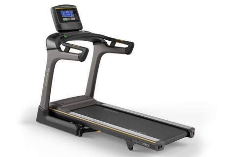 Matrix TF50 folding treadmill with black frame, gray accents, digital display console, and black running deck on white backgr