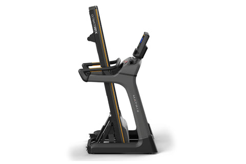 Matrix TF50 folding treadmill with black frame, gray accents, digital display console, and black running deck on white backgr