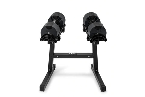Black adjustable dumbbell stand with double legs, two horizontal arms with multiple clamps, and rubberized feet on white back