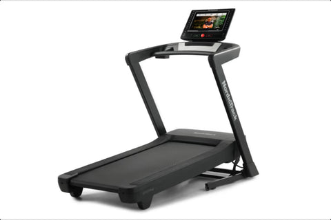 Black NordicTrack EXP 14i treadmill with digital console displaying workout content, on white background