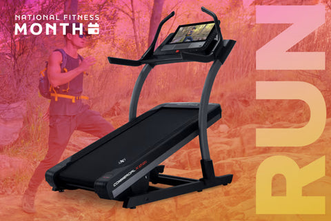 NordicTrack X22i Commercial treadmill with black belt, gray frame, dual curved handles, and touchscreen display on white back