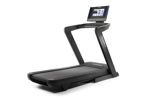 Black NordicTrack commercial treadmill with digital touchscreen console mounted on curved handlebars, wide running deck, on w