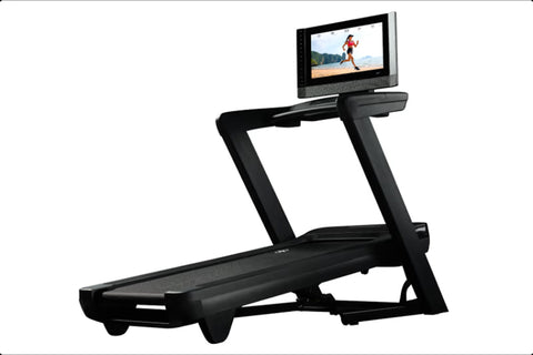 Black NordicTrack 2450 commercial treadmill with digital touchscreen displaying running workout on white background