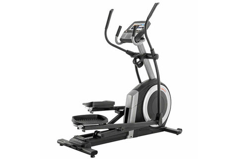 ProForm Carbon E10 elliptical trainer with black pedals, silver frame, digital console, and curved handlebar grips on white b