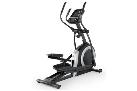 Black and white ProForm Carbon EL elliptical machine with digital display console, dual handles, and foot pedals on white bac