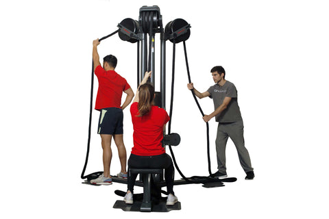Black vertical rope trainer with dual handles and foot platform on white background