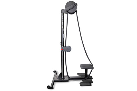 Man in red shirt using black upright rope trainer machine with pulley system on white background