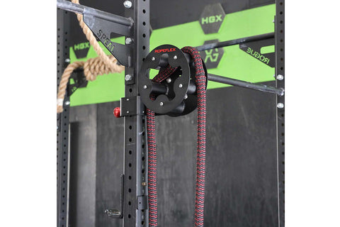 Ropeflex RX505 black rope drum attachment with red and black rope, mounted on HBX power rig
