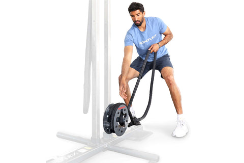 Ropeflex RX505 black rope drum attachment with red and black rope, mounted on HBX power rig