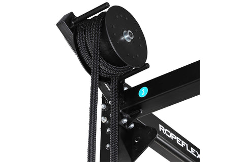 Ropeflex RXPRO2 rope trainer attachment with black braided nylon rope coiled on metal frame, mounted on white background