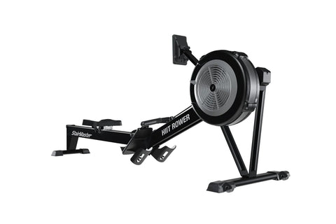 A black StairMaster HIIT Rower machine, featuring a fan-based resistance system for rowing workouts.