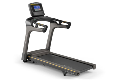 Matrix TF30 folding treadmill with gray and black frame, digital display console, dual handles, and black running deck on whi