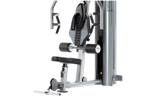 TuffStuff Apollo 7000 Multi Press gray and black cable machine with adjustable seat and leg extension, on white background