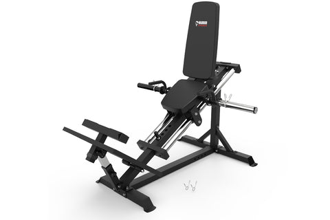 Black compact leg press machine with padded seat and backrest, metal frame, and foot platform on white background