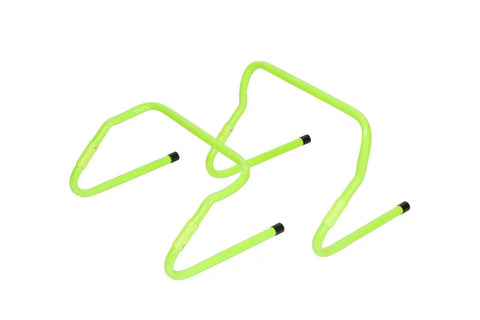 Bright lime green adjustable speed hurdles with black foot pegs on white background