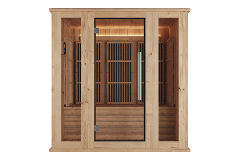 Light wood infrared indoor sauna with black-framed glass door, vertical slat interior panels, wooden benches, and illuminated