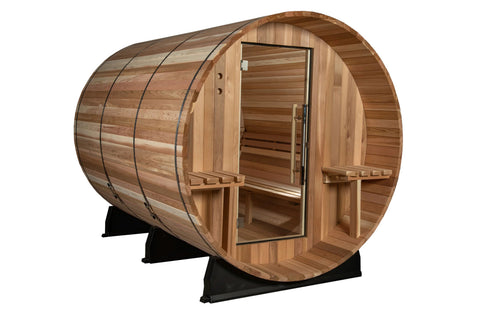 Cylindrical wooden barrel sauna with cedar construction, open door, built-in benches, and black metal support frame on white 