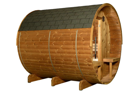 Barrel sauna with rounded cedar wood construction, open door showing wooden interior benches, dark roof shingles, and vent op