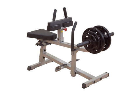 Black seated calf raise machine with padded seat, adjustable backrest, dual vertical handles with grips, and angled foot plat