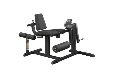 Black leg extension and curl machine with padded seat, backrest, and leg attachments on white background
