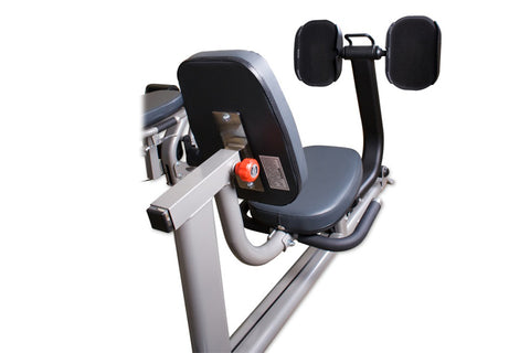 BodyCraft Elite home gym leg press machine with silver frame, black padded seat and backrest, adjustable leg extension arms w