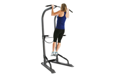 BodyCraft T3 Total Training Tower with woman performing pull-up exercise, gray steel frame on white background