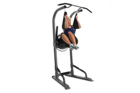 BodyCraft T3 Total Training Tower with woman performing pull-up exercise, gray steel frame on white background