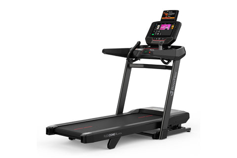 Black motorized treadmill with digital console displaying purple screen and tablet holder, featuring red accents on belt, on 