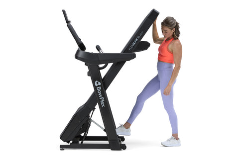 Black Bowflex T9 treadmill with digital console display, cushioned running deck, and handlebars on white background