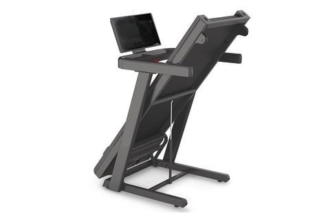 Black motorized treadmill with digital display tablet mounted on top showing workout metrics and yellow circular interface, o