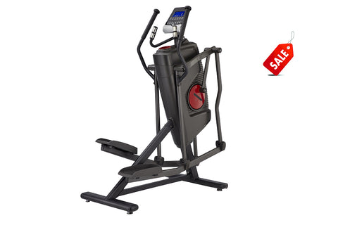 Black elliptical machine with red accent wheel, digital blue display console, and fixed handlebar grips, on white background