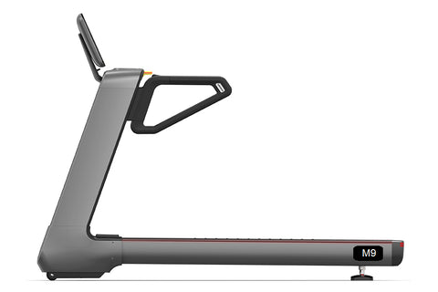 Black and gray commercial treadmill with digital touchscreen console displaying workout metrics and colorful app icons