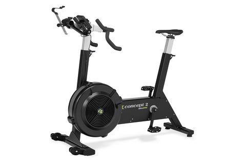 Concept2 BikeErg stationary exercise bike with black frame, gray accents, curved handlebars, and large black flywheel, on whi