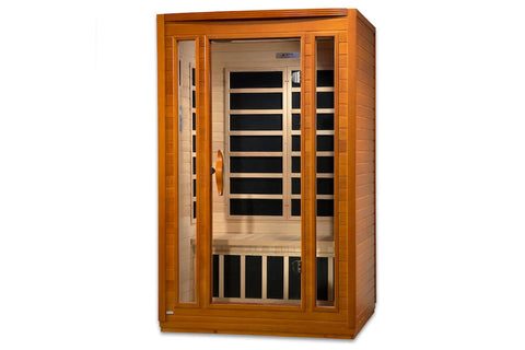 Dark honey hemlock wood infrared sauna with glass door and black interior panels, two-person capacity on white background