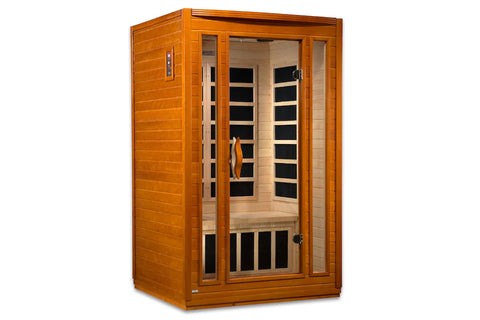 Dark honey hemlock wood infrared sauna with glass door and black interior panels, two-person capacity on white background