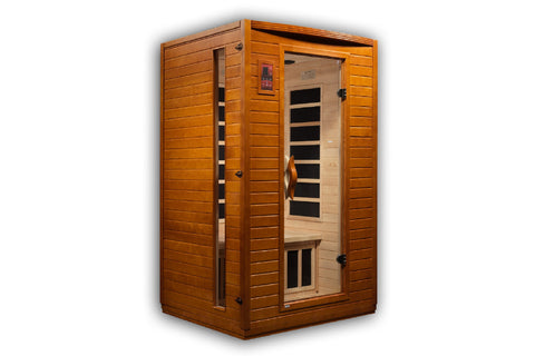 Golden cedar wood infrared sauna with glass door, digital control panel, and black heating elements visible inside on white b