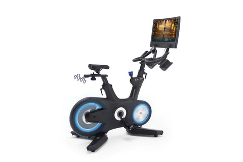 Black stationary exercise bike with pink illuminated wheels, digital console, and adjustable tablet holder on white backgroun