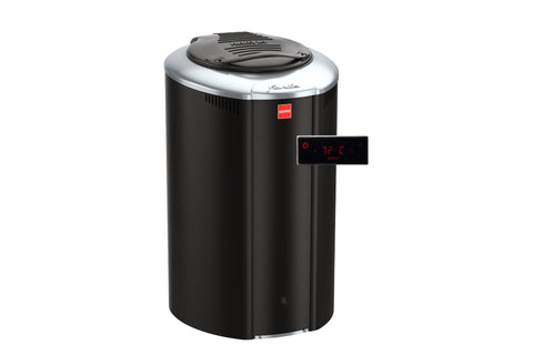 Harvia Forte electric sauna heater with black cylindrical body, silver top, digital control panel displaying temperature, on 