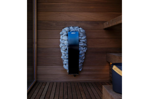 Harvia Spirit electric sauna heater with gray stones, digital control panel, and smartphone app display on white background