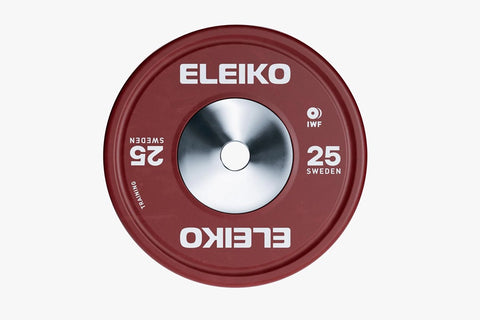 Set of four Eleiko IWF training bumper plates in red, blue, yellow, and green with white text on white background