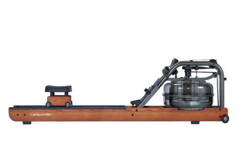 Apollo Pro rowing machine with wood-grain finish, digital display, and dual foot pedals on white background