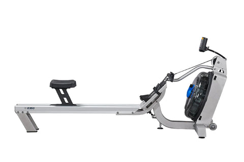 Fluid Rower E350 with gray frame, black seat, large blue flywheel, and digital monitor on mounting arm, on white background